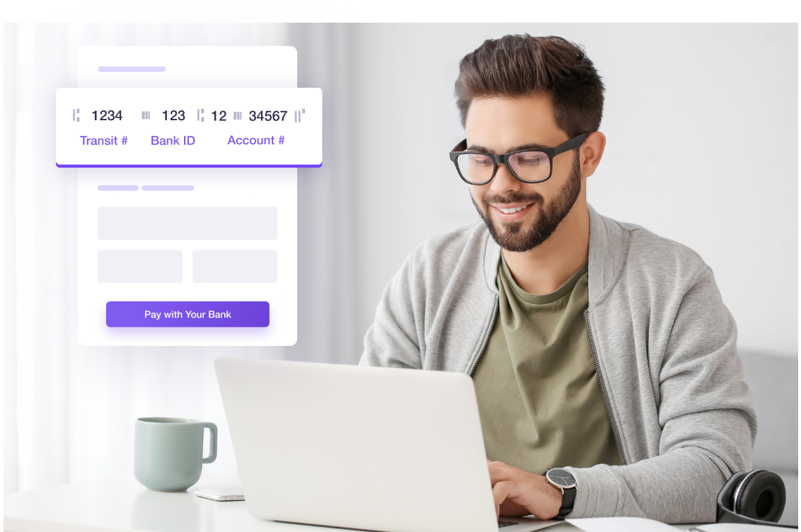 Merchant on his laptop looking at ACH payments